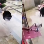 狂風把黑傘吹飛「眼看就要打到人」 霸氣哥一伸手扭轉結局帥翻天