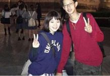 情侶在迪士尼城堡前合照,上傳後網民全嚇瘋 :你是在牽誰的手?