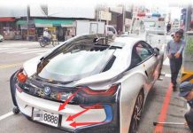 臺中豐原有臺千萬BMW i8超跑違規停車,警3分鐘強制拖走!沒想到車主竟然……這下慘了!